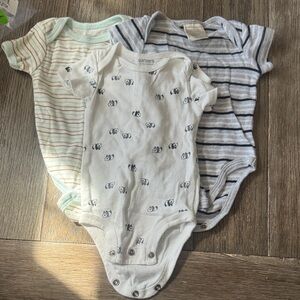 Carter's 0-3 and 3 month size onesies.